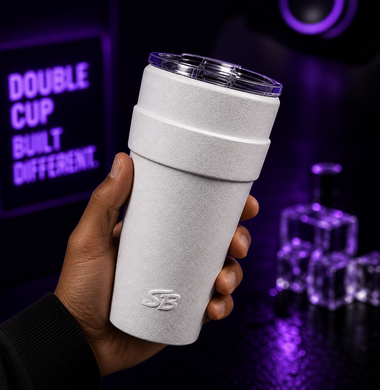 Hand holding a white Double Cup tumbler