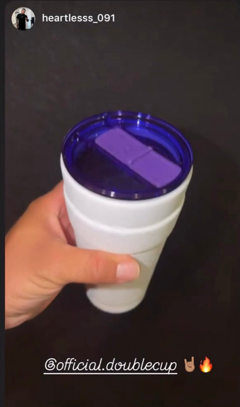 Customer photo holding a Double Cup tumbler